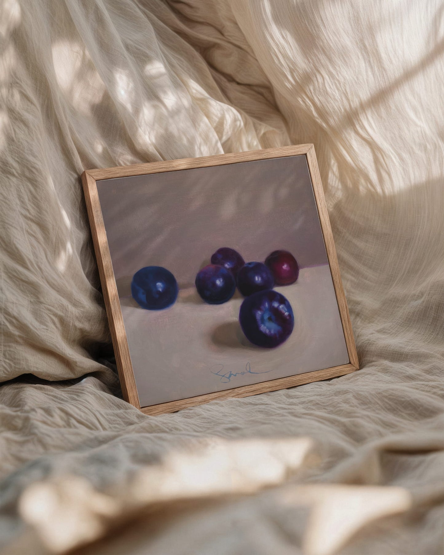 6 pretty plumbs sitting in a row